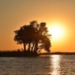 De zonsondergang in Botswana