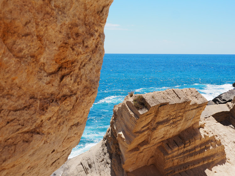 atlantis Ibiza geheim strand grote rotsen